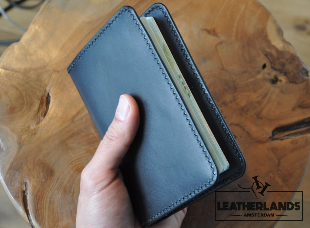 The Domo Passport Holder In Black Handstitched